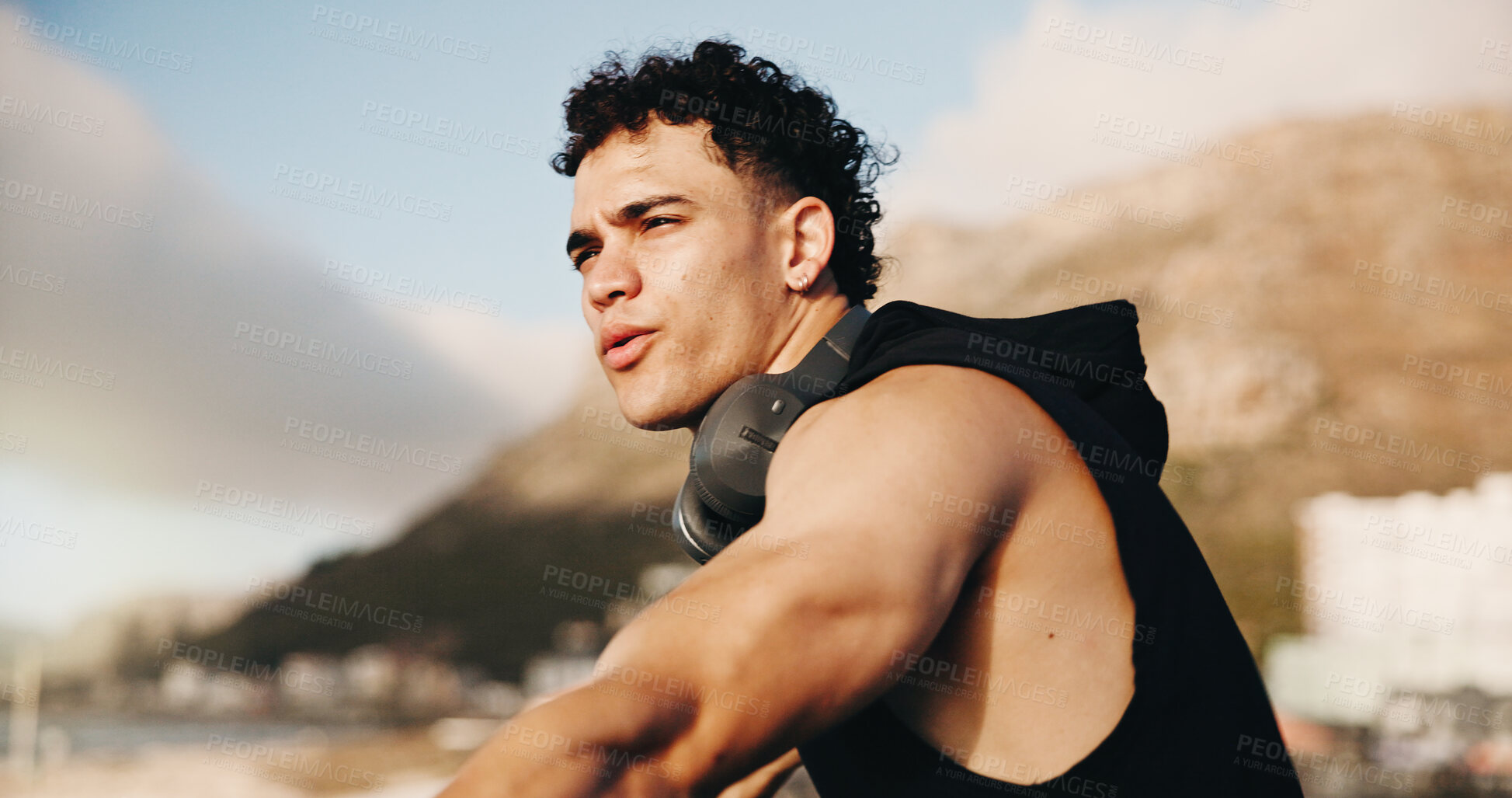 Buy stock photo Beach, athlete and man with headphones on break, remember and thinking of fitness plan for wellness. Ocean, runner and person with technology in nature, space and healthy with workout or reflection