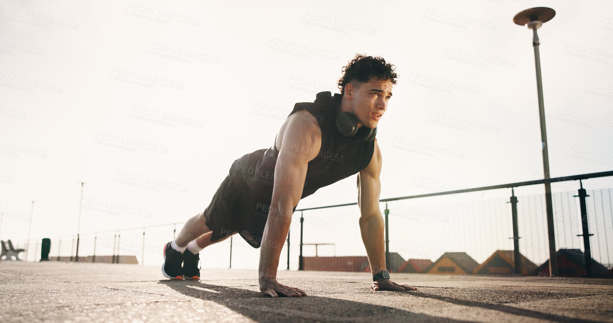 Buy stock photo Fitness, push up and man in city for exercise, core workout and training for cardio, health and wellness. Athlete, sports and person in morning with active hobby for muscles, endurance and challenge