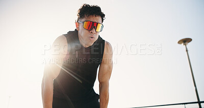 Buy stock photo Fitness, tired and man breathe for exercise, training and workout break outdoor. Athlete, flare and person with fatigue for wellness, health and active hobby for runner challenge, recovery and sport