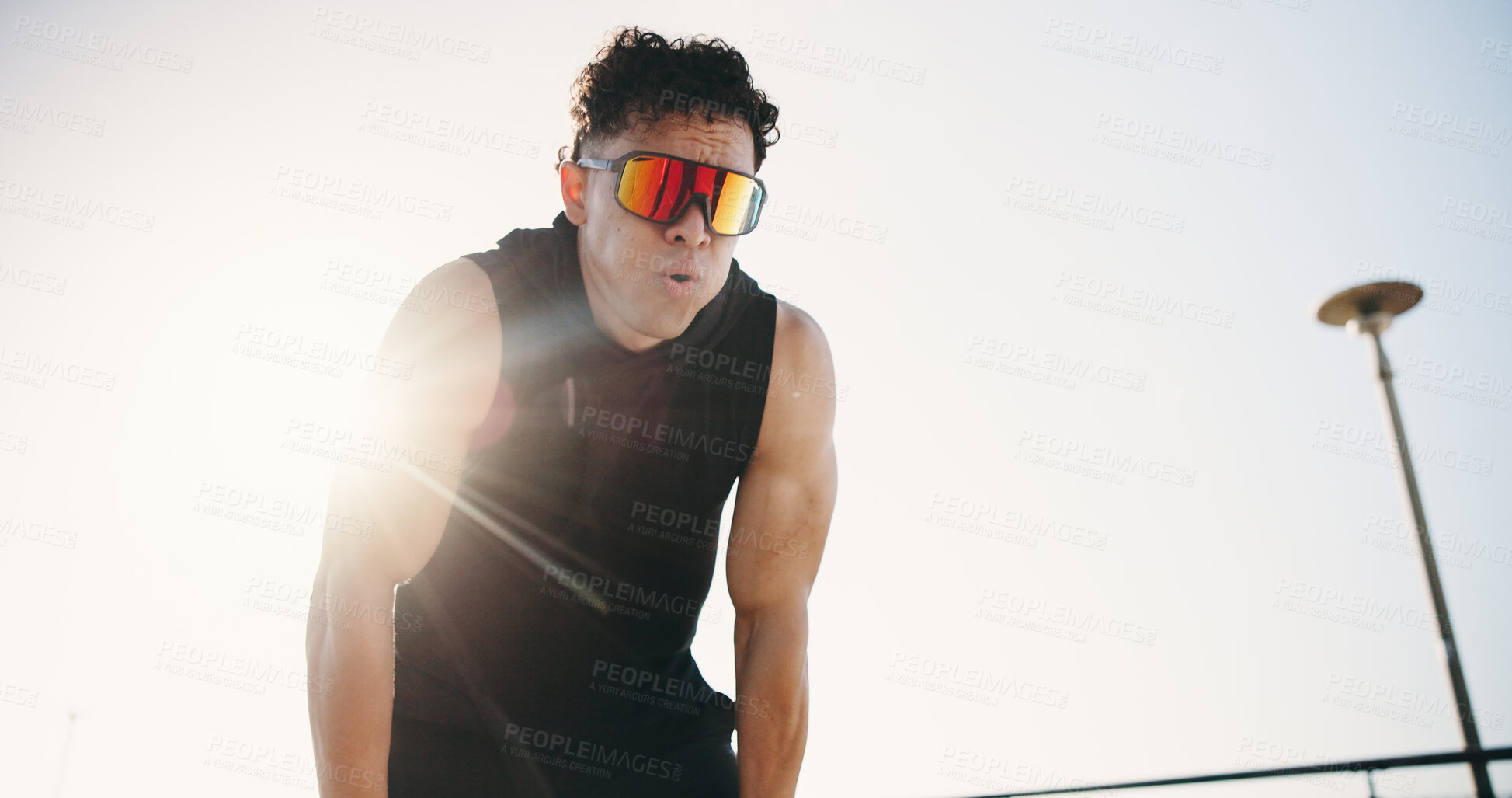 Buy stock photo Fitness, tired and man breathe for exercise, training and workout break outdoor. Athlete, flare and person with fatigue for wellness, health and active hobby for runner challenge, recovery and sport