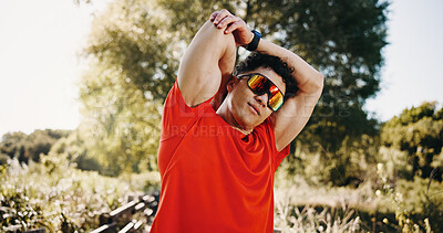 Buy stock photo Stretching, arms and man in nature with sunglasses for exercise, workout and training for wellness. Athlete, runner and person with warm up for health, cardio and fitness with polarized lens outdoor