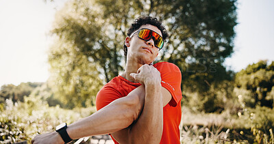 Buy stock photo Nature, fitness and man stretching arms to start exercise, workout and training for cardio. Runner, athlete and person with warm up for endurance, mobility and wellness for active hobby outdoor