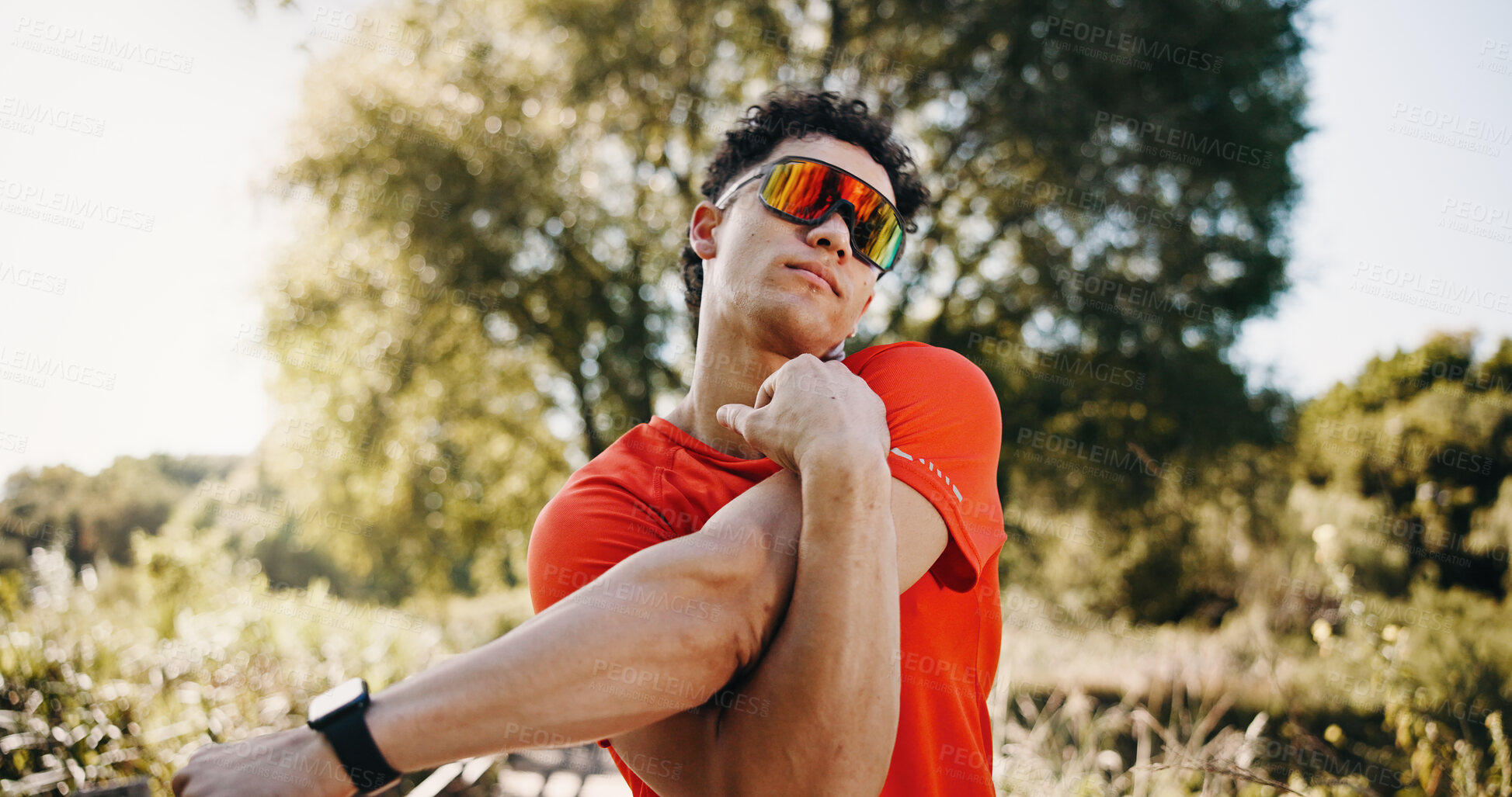 Buy stock photo Nature, fitness and man stretching arms to start exercise, workout and training for cardio. Runner, athlete and person with warm up for endurance, mobility and wellness for active hobby outdoor