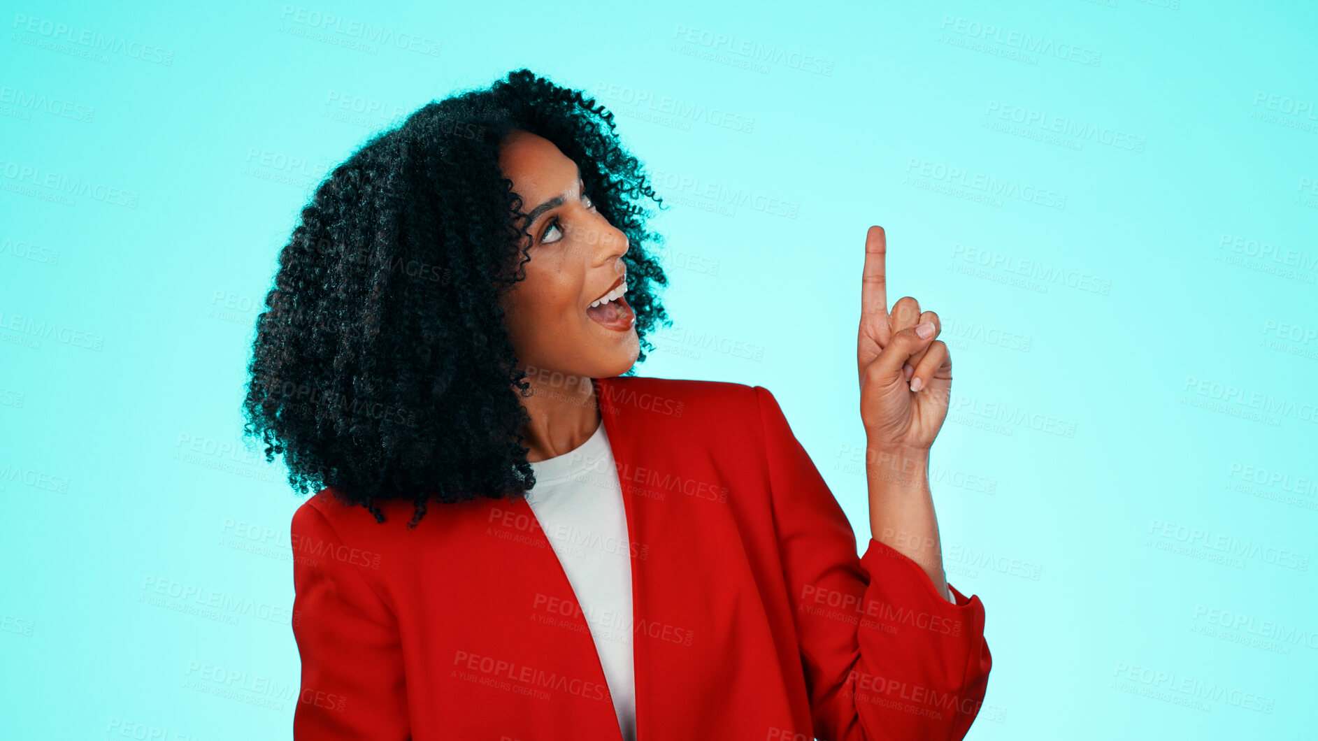 Buy stock photo Happy, business and woman in studio, pointing up and opportunity on blue background. Smile, person and employee with hand gesture, advertising choice and information for about us and presentation
