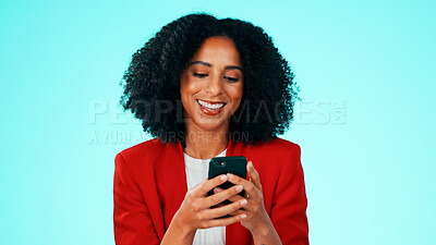 Buy stock photo Business, smile and woman in studio, phone for social media and email alert on blue background. Person, space and employee with tech, internet and research for website info, app or message to contact