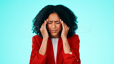 Buy stock photo Frustrated, woman and studio with headache for business stress or pressure on a blue background. Tired, female person or employee with migraine or sore ache for fatigue, mental health or deadline