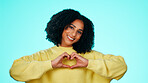Heart hands, love or woman with portrait, support and compassion in friendly symbol. Happiness, mockup space and person with care emoji, positive gesture and kindness shape on studio background.