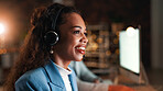 Evening, call center and woman with smile, headset for communication and system solution. Night, person or employee in workplace, talking and consultation for advice, bokeh or contact us for feedback