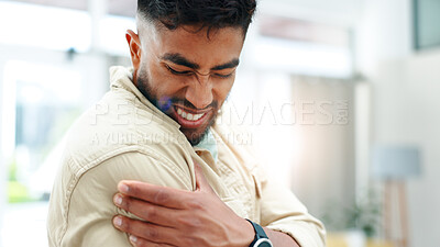 Buy stock photo Man, discomfort and ache of shoulder pain in home from injury, muscle strain and pinched nerve. Male person, sore or joint fatigue with inflammation, fibromyalgia and cramps of osteoporosis condition