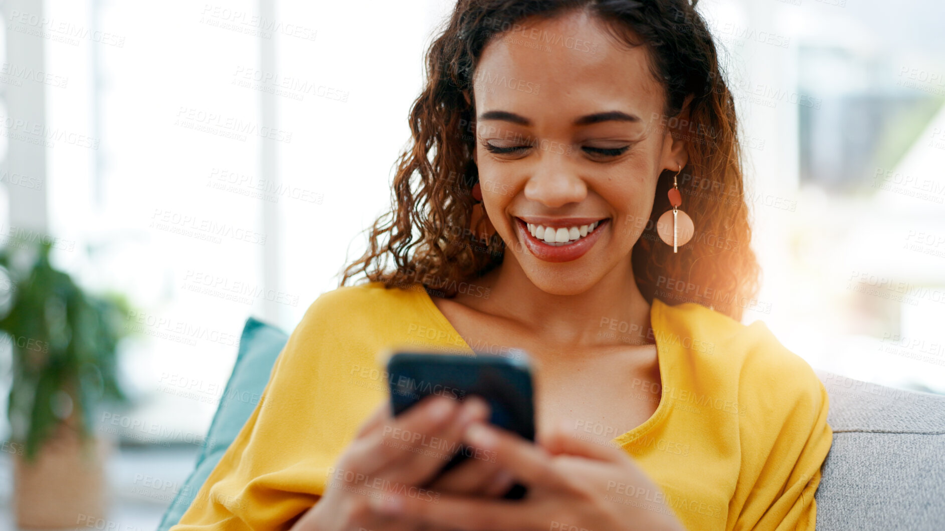 Buy stock photo Smile, phone and woman in home for relax, social media or download dating app in living room. Mobile, sofa and person with matchmaking website for connection search, communication and text message