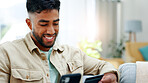 Credit card, phone and man in home for payment, investment or online shopping in living room. Mobile, sofa and happy person with debit for digital money, internet banking or financial purchase