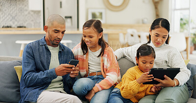 Buy stock photo Tech, family and girls in home, internet and digital app for social media, relax and bonding together. Apartment, mother or father on sofa, talking or daughters with tablet or phone for entertainment