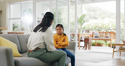 Buy stock photo Talking, discipline and mom with child on sofa for behavior, tantrum and bad attitude in home. Parenting, family and mother with girl in lecture, discussion and scold for rules, conflict and naughty