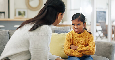 Buy stock photo Talking, discipline and mom with girl in home for behavior, tantrum and bad attitude for parenting. Upset, family and mother with child in lecture, discussion or scold for rules, warning and stubborn