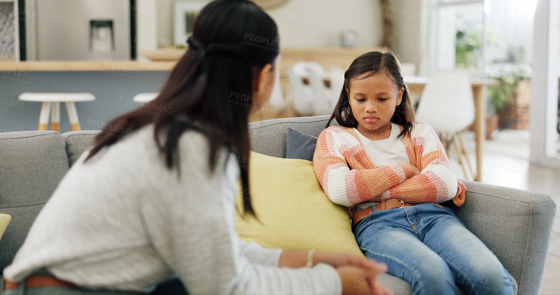 Buy stock photo Listening, discipline and mom with girl on sofa for behavior, trouble and bad attitude in home. Parenting, family and mother with child in lecture, discussion and scold for rules, conflict or dispute