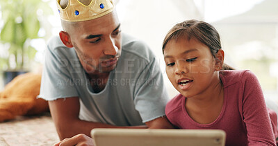 Buy stock photo Love, dad or girl on floor with tablet, cartoon streaming or bonding together with movie binge. Digital, man or child in house with tech, multimedia subscription or family connection in living room.