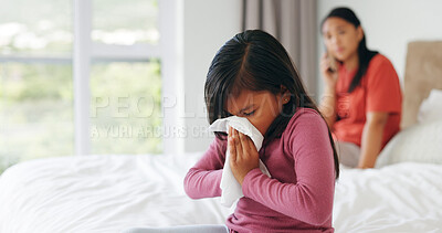 Buy stock photo Health, sneezing and tissue with girl in bedroom of home for sinus infection or virus. Cold, flu and blowing nose with mom on phone call for sick daughter, appointment or checkup in apartment