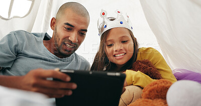 Buy stock photo Streaming, dad or girl in house with tablet, cartoon show or bonding with movie binge. Digital, man or child in tent with tech, multimedia subscription or family connection in healthy relationship.