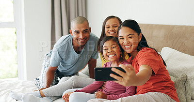 Buy stock photo Selfie, parents and girls in bedroom, smile and bonding together with profile picture. Happy family, mother and father in home, daughters and capture moment with care, memory for love and excited