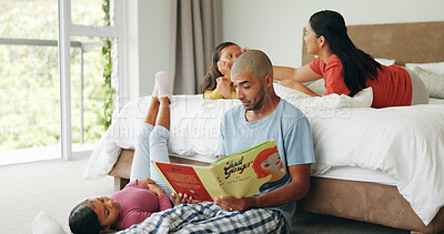 Buy stock photo Dad, kid and reading book in bedroom for storytelling, education and bonding with parent on floor. Father, girl and literature in home for child development, learning language and growth with family