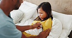 Fever, temperature and dad with girl for thermometer test, disease and healthcare in bed. Family, father and armpit check with child in bedroom for flu, virus and parenting for recovery in home