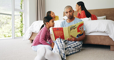Buy stock photo Father, daughter and reading in bedroom with book, bonding together and learning for development. Family, dad or children in home with mom, talk or storytelling for knowledge growth on weekend break.