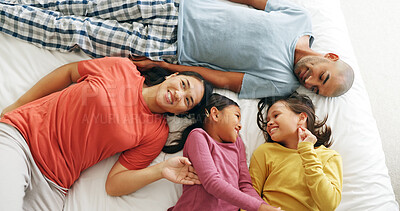 Buy stock photo Above, parents or kids on bed with love, childcare or healthy relationship on weekend break. Smile, people or children in house with bonding, parenthood or family connection in childhood development.