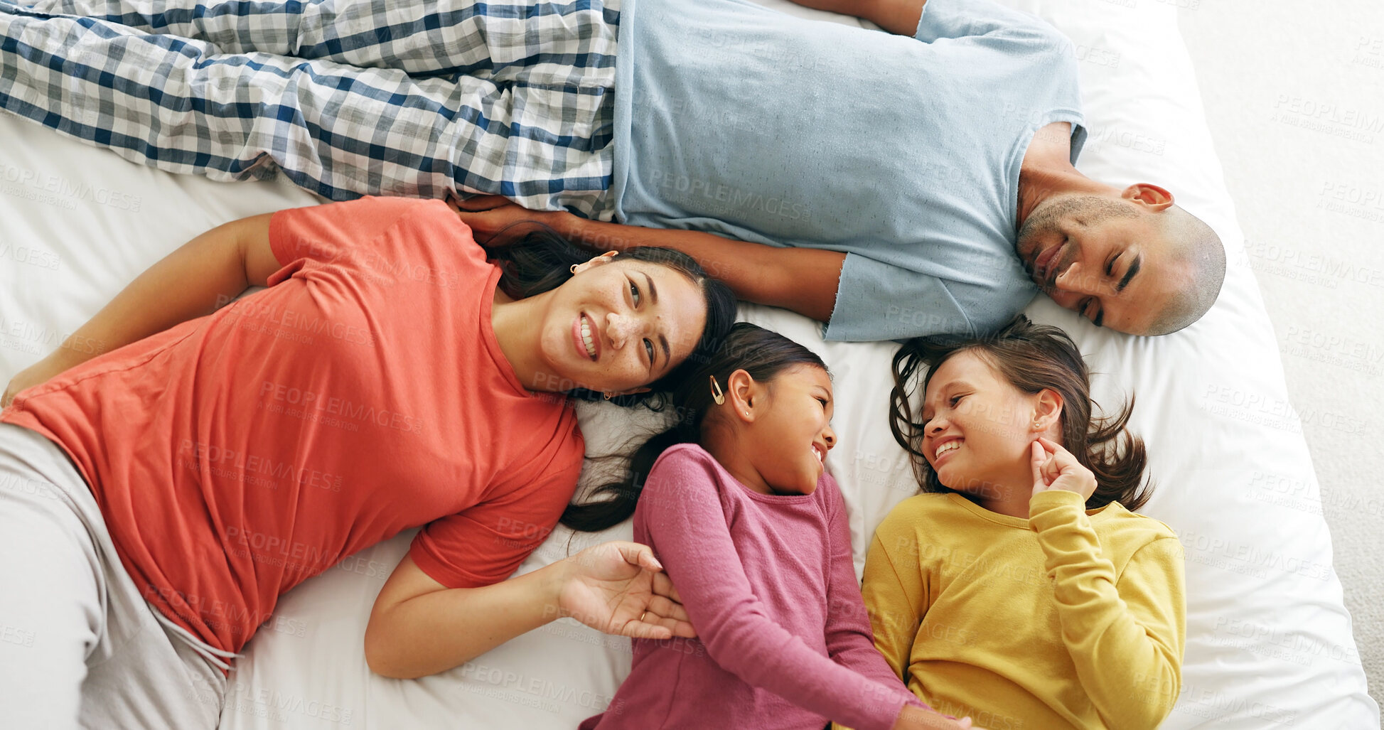 Buy stock photo Above, parents or kids on bed with love, childcare or healthy relationship on weekend break. Smile, people or children in house with bonding, parenthood or family connection in childhood development.