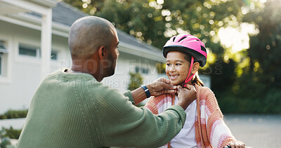 Buy stock photo Development, helmet and father teaching daughter how to ride bicycle outdoor in front of home. Protection, safety and smile of girl child with single parent man in driveway for cycling or learning