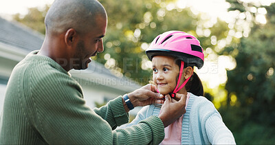 Buy stock photo Helmet, protection and father teaching daughter how to ride bicycle outdoor in front of home. Development, safety and smile of girl child with single parent man in driveway for cycling or learning