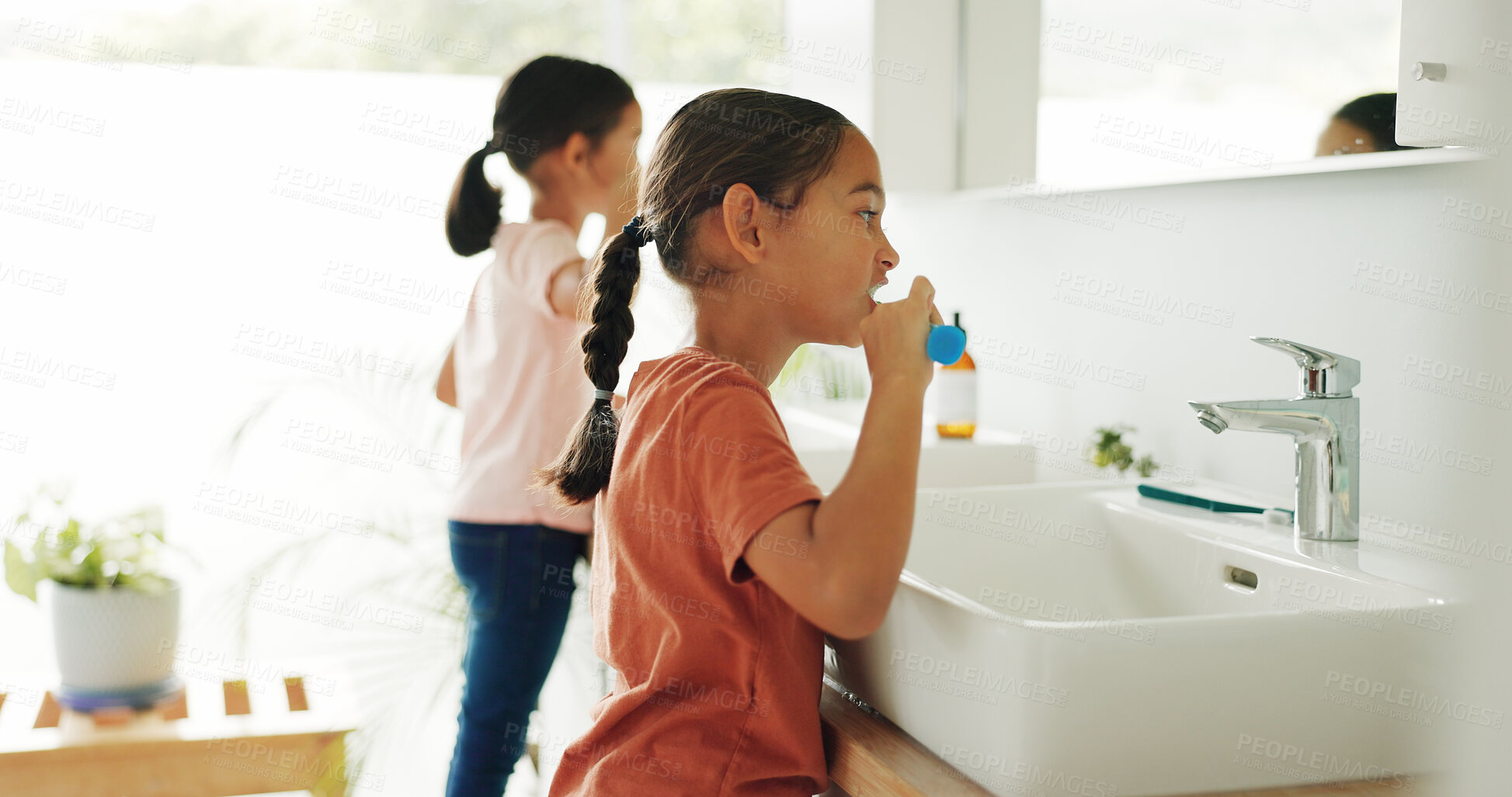 Buy stock photo Sisters, girl or brushing teeth by sink in bathroom, oral hygiene or morning routine for wellness. Healthy habit, grooming together or children with toothbrush for dental care, cleaning mouth or home