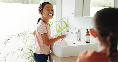 Buy stock photo Kids, dental health and show teeth in bathroom for gum wellness, self care and fresh breath. Girl, toothbrush and cleaning in home for oral hygiene, orthodontics and dentistry for development