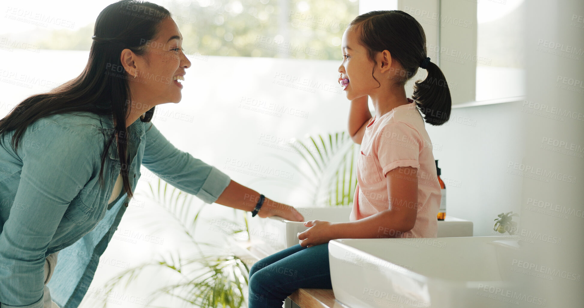 Buy stock photo Child, mom or brushing teeth for dental health in bathroom, gum wellness or laugh with parent. Girl, toothbrush and learning with funny mother in home, cleaning mouth and teaching oral hygiene
