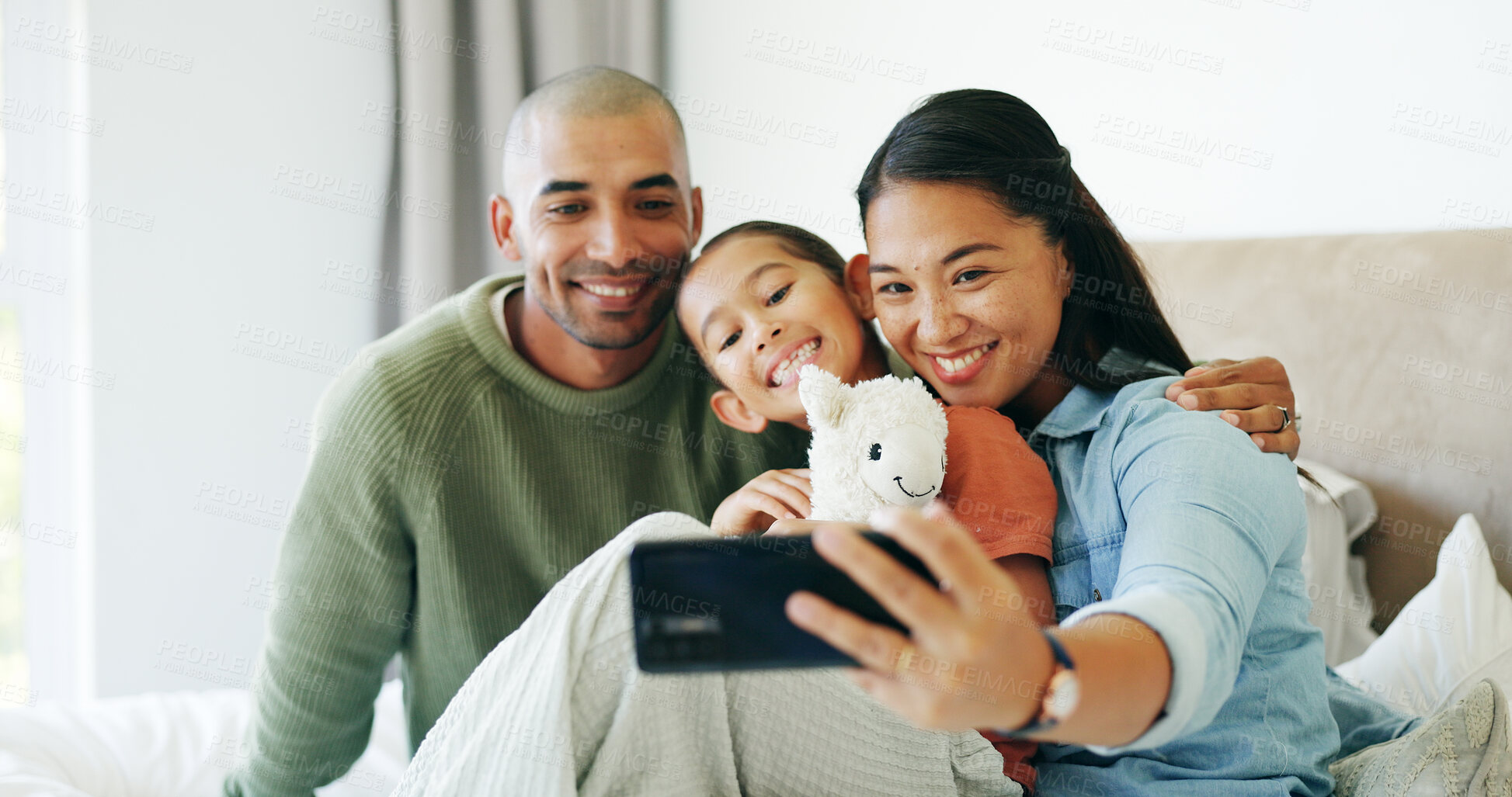 Buy stock photo Happy family, parents and girl with selfie in bedroom, social media post and bonding for cozy weekend. Profile picture update, toy and people with child for photography, support and smile in home