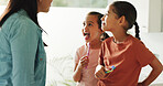 Kids, mom and check for dental health in bathroom, gum wellness and fresh breath with parent. Girls, toothbrush and mouth inspection with mother in home, clean teeth and learning oral hygiene