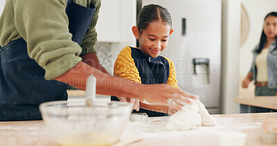 Buy stock photo Happy, baking and parents with child in kitchen for bonding with pastry, dough and prepare dessert. Family, home and girl with mom, dad and helping for learning recipe, cookies and cake together