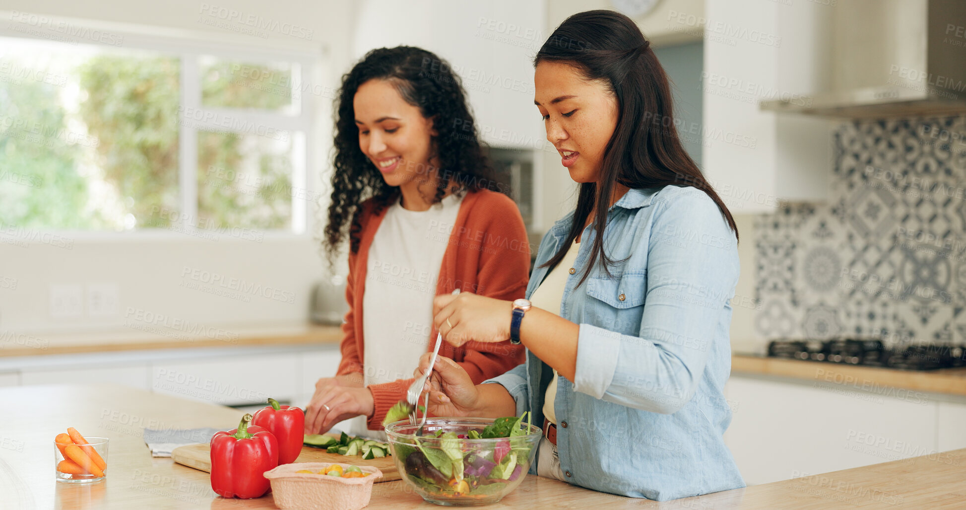 Buy stock photo Cooking, vegetables and friends in kitchen with health, nutrition or wellness salad for dinner in home. Happy, lunch and female people with fresh ingredients for preparing supper in apartment.