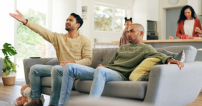 Buy stock photo Upset, annoyed and men watching sports on sofa in home with losing, bad game or disappointed. Frustration, sad and male friends streaming football or soccer together in living room at apartment.