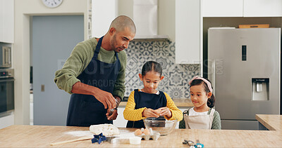 Buy stock photo Kitchen, father and kids baking with eggs for learning recipe, cake mixture and child development. Family bonding, dad and girls with cookie ingredients for dessert, teaching skills and help in home