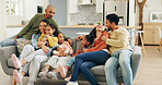 Funny, family and girls in home, happiness and bonding together in living room. Apartment, people and kids on couch, relax and laughing for joke, weekend break and parents with daughters and humor
