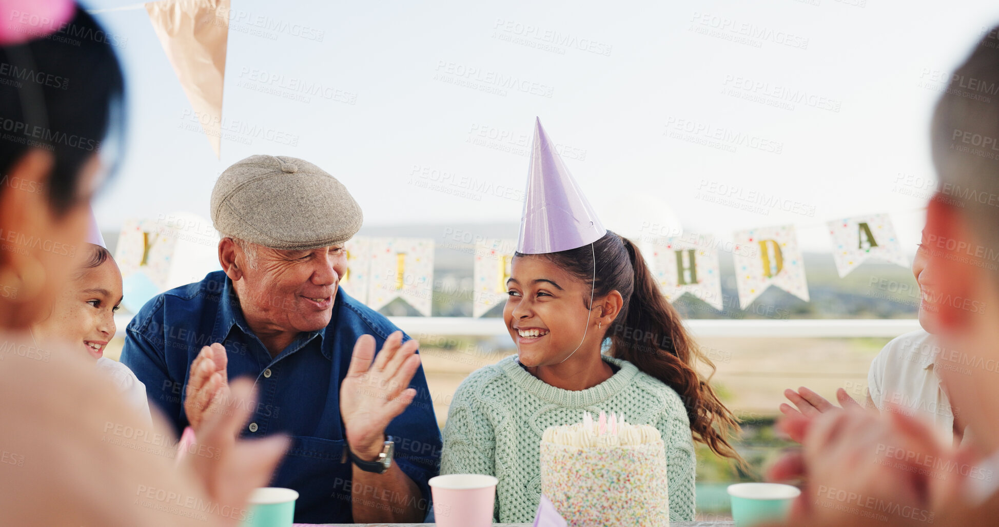 Buy stock photo Grandfather, kid or applause for birthday at patio, bonding together or congratulations with family. Cake, happy girl and clap at party for special day, celebrate or children with generations outdoor