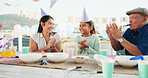 Happy, family and child at birthday party with applause, cake and generations bonding for support. People, clap and mom outdoor in backyard with daughter, grandfather and celebration for special day.