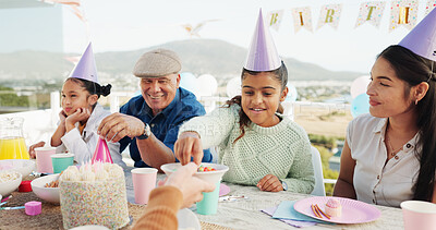 Buy stock photo Happy, family and children at birthday party with candy, snacks and generations bonding in backyard. People, smile and girls outdoor on patio with mother, grandfather or sweets for celebration event.