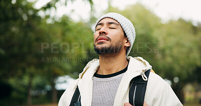 Buy stock photo Relax, breathing and hiking with man in nature for eco tourism, travel adventure and national park. Sustainability vacation, backpacking and trekking with person outdoor for wellness and peace