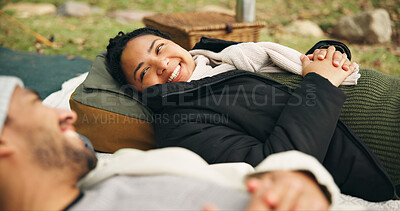 Buy stock photo Happy woman, relax and man on picnic blanket for conversation with funny story, chat or camping. People, couple and getaway in nature with bag, bonding and vacation with relationship in countryside