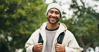 Buy stock photo Smile, portrait and hiking with man in nature for eco tourism, travel adventure and national park. Sustainability vacation, backpacking and trekking with person outdoor for wellness and explore