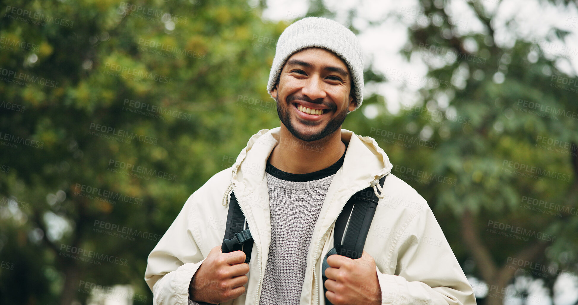 Buy stock photo Smile, portrait and hiking with man in nature for eco tourism, travel adventure and national park. Sustainability vacation, backpacking and trekking with person outdoor for wellness and explore