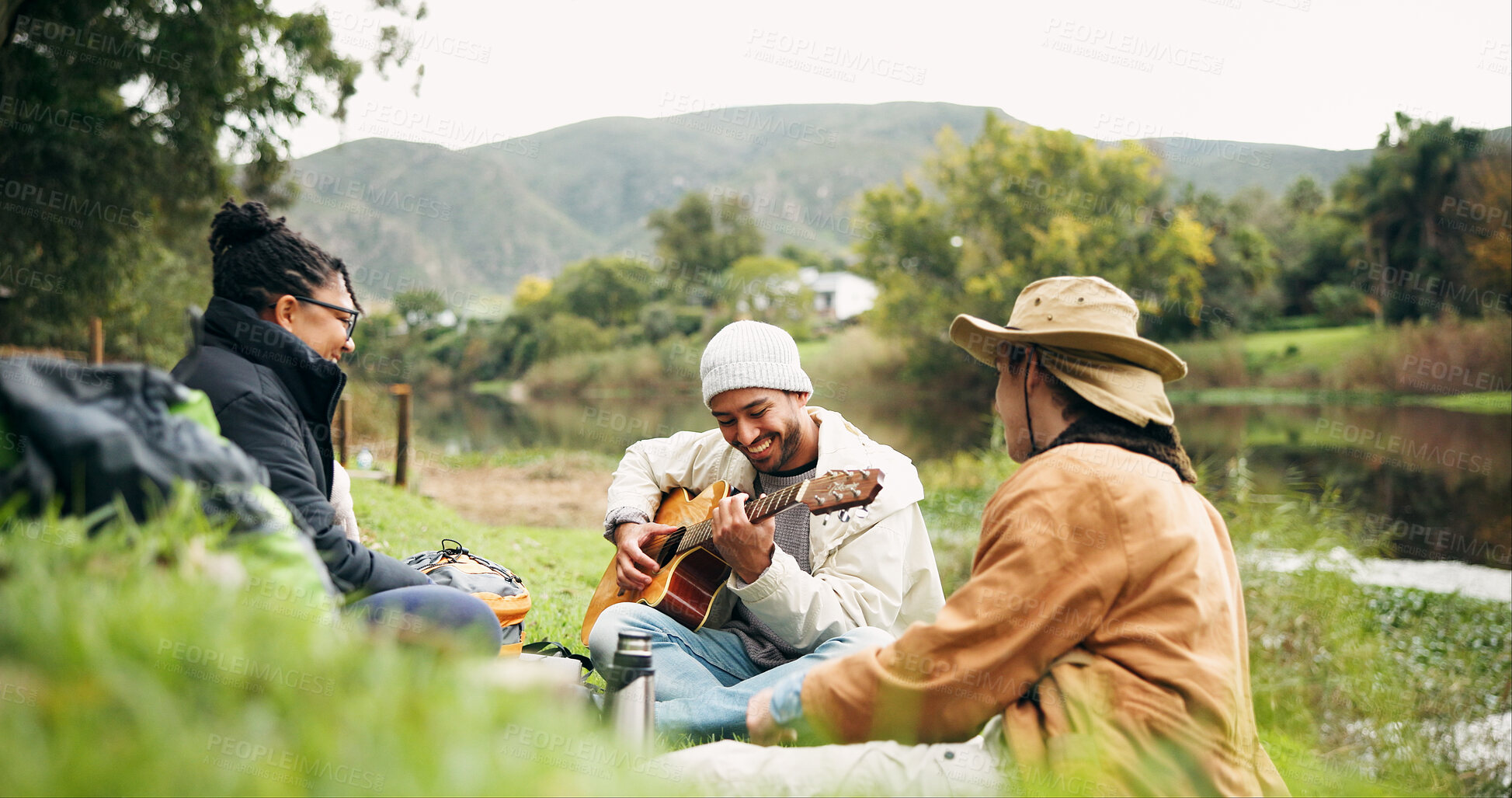 Buy stock photo Camping, friends and people in nature, guitar and bonding together for reunion, relax and singing. Outdoor, musician or group in forest, happiness and string instrument for performance or countryside