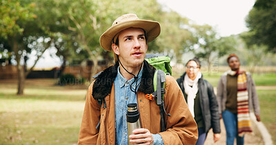 Buy stock photo Thinking, walk and hiking with man in nature for eco travel vacation, adventure or weekend break. Trekking, holiday and sustainability tourism with people outdoor for explore, vision and friends trip