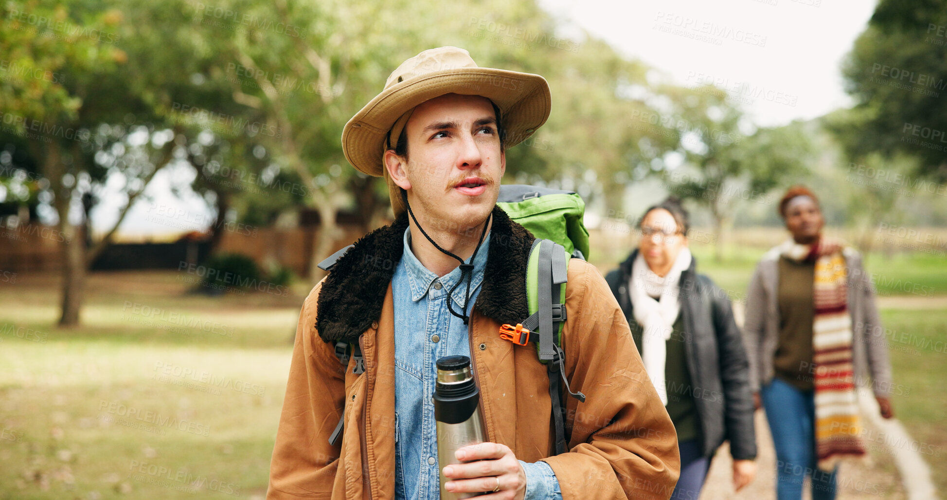 Buy stock photo Thinking, walk and hiking with man in nature for eco travel vacation, adventure or weekend break. Trekking, holiday and sustainability tourism with people outdoor for explore, vision and friends trip